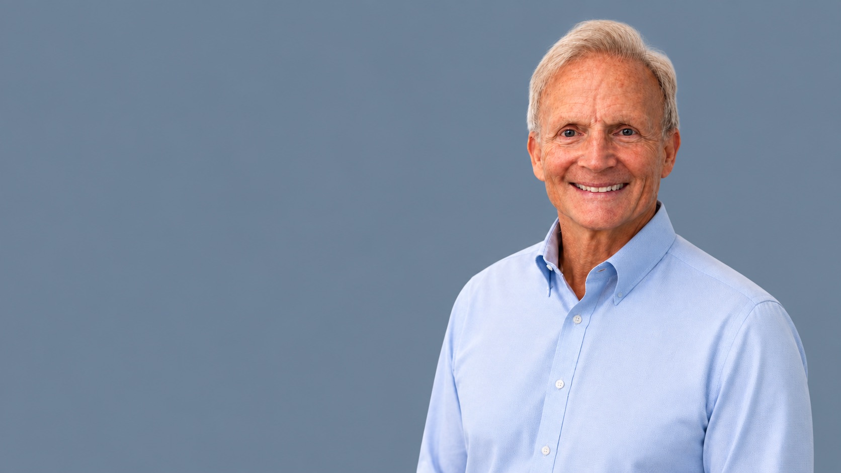 Dr. F. Blake Ambridge in a light blue shirt